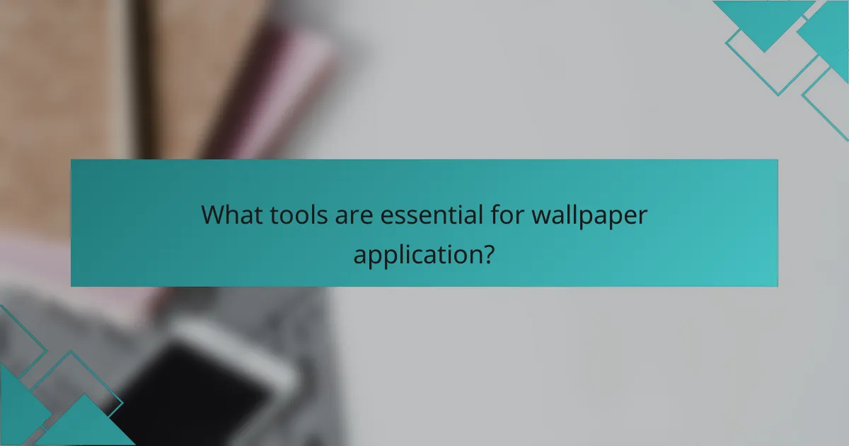 What tools are essential for wallpaper application?